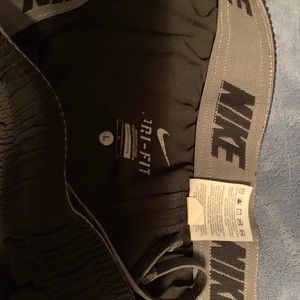 Nike sweat pants and Hollister shorts.